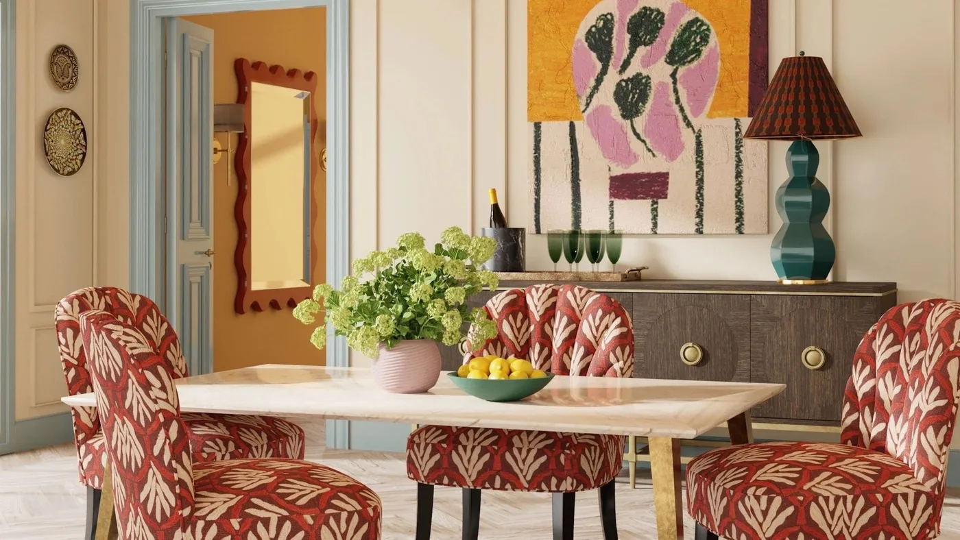 Dining room with rust botanical chairs, pale table, blue doorway trim, colorful artwork and a green sculptural lamp