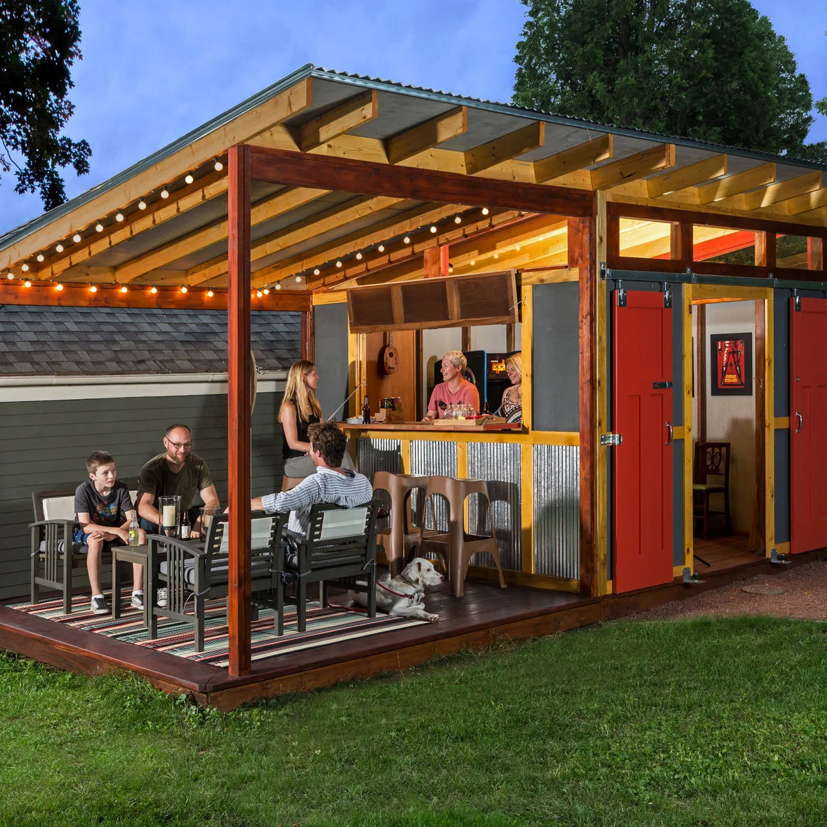Wood garden pub shed with an open serving hatch, covered deck, table and stools