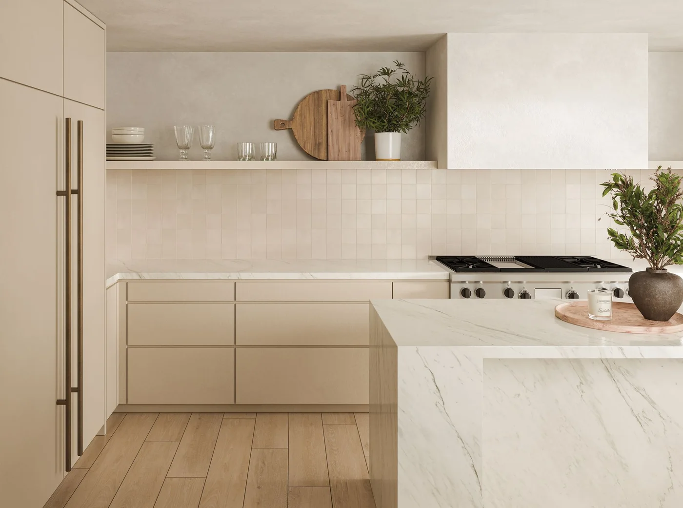 Light beige flat-front kitchen cabinets sit beside pale square tiles, a white hood and a lightly veined island