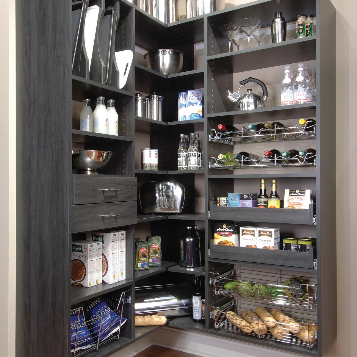 Dark pantry shelving with vertical tray dividers, food shelves and lower wire baskets