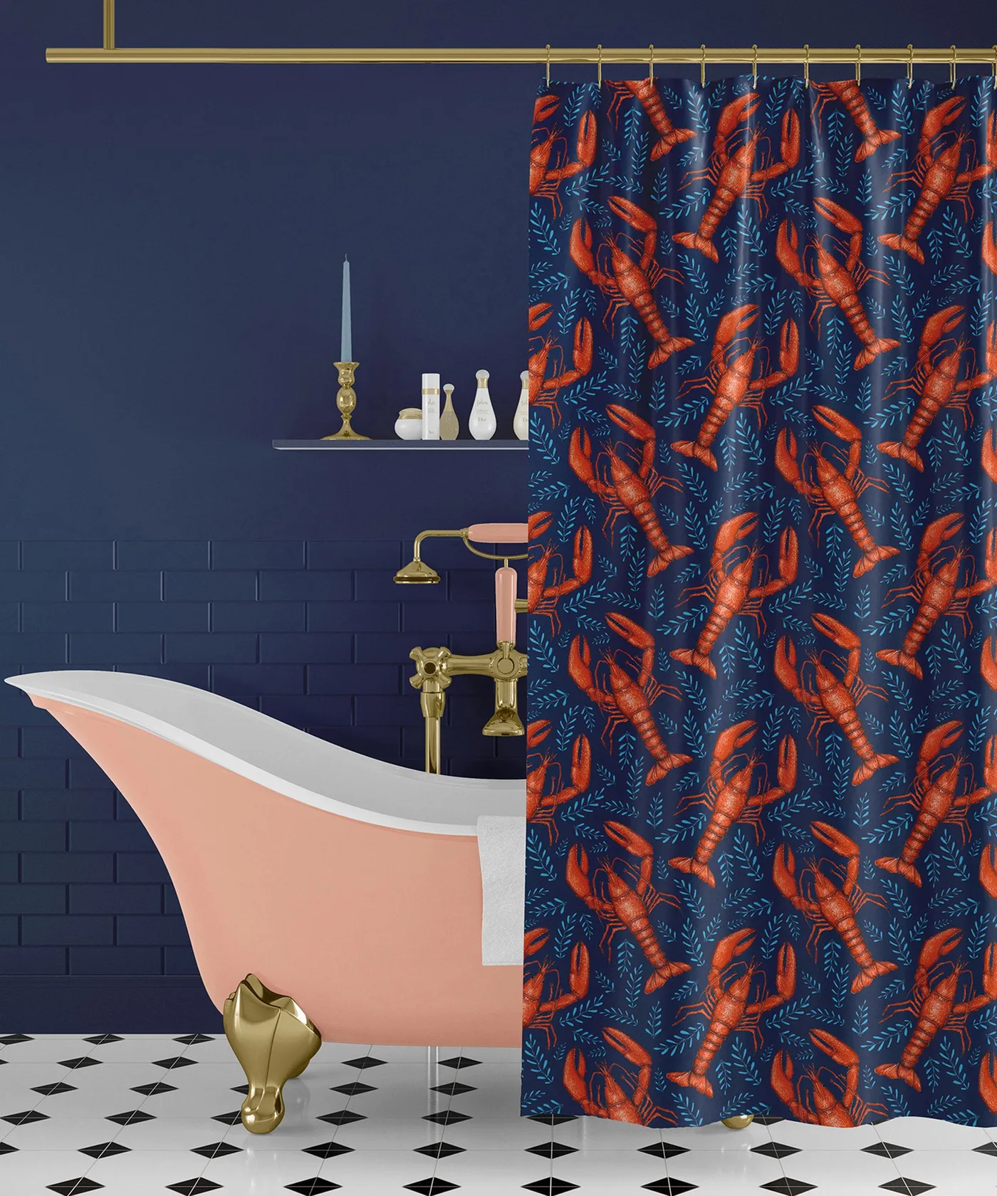 A navy bathroom wall and blue lobster-patterned shower curtain sit beside a pink bath with gold-colored fittings