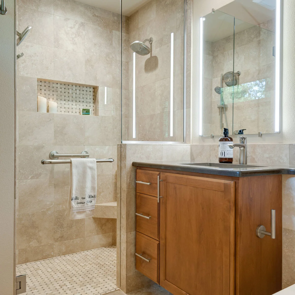 Wooden bathroom vanity with a narrow drawer stack and side towel rail