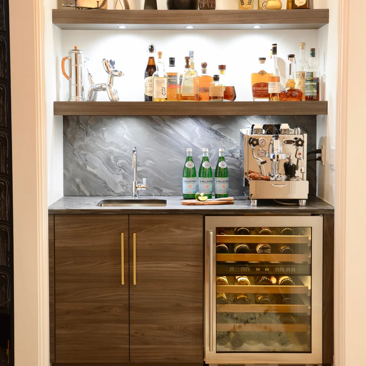 Wooden beverage station with espresso machine, small sink and glass-front fridge