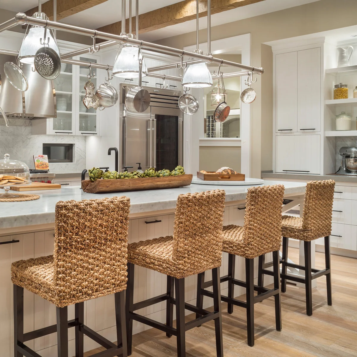 Kitchen stools with thick woven seats and backs on dark square-legged frames